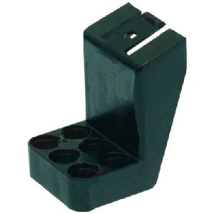 Держатель с отверстиями для трубок вывода продукта